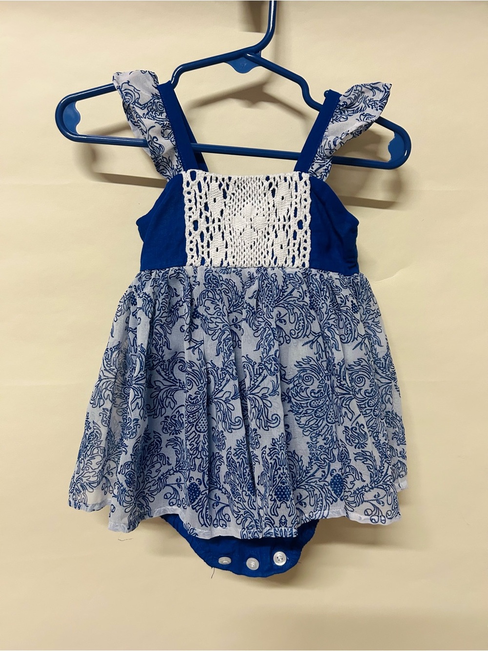 Well Dressed Wolf Blue & White Printed Baby One-Piece with Lace Bodice